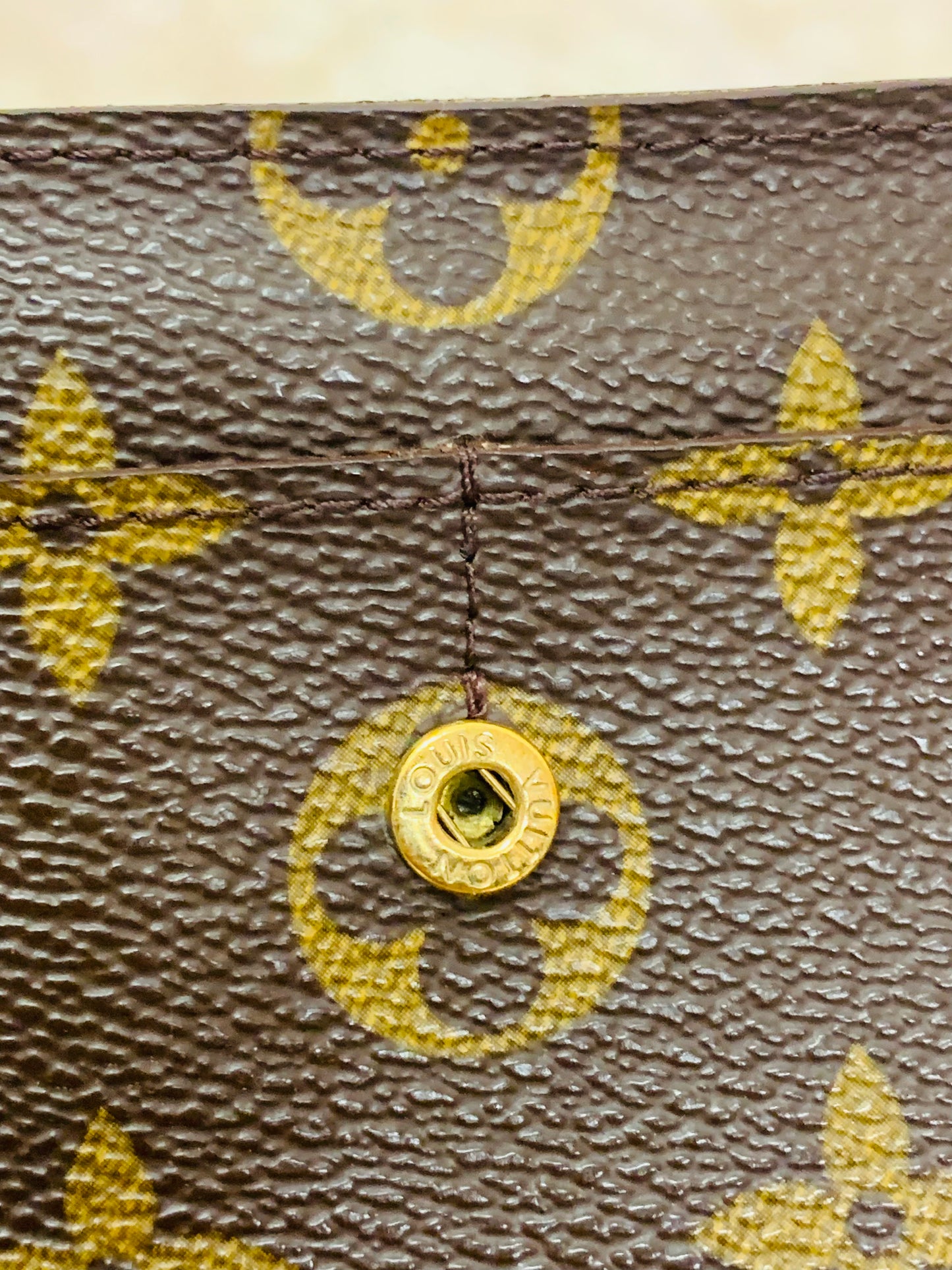 LOUIS VUITTON
Monogram Sarah Wallet