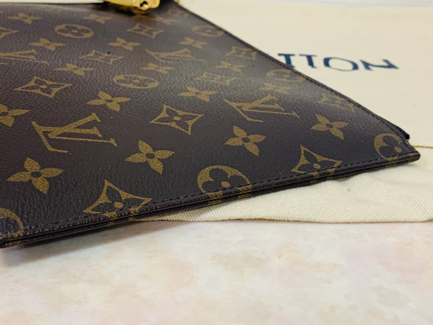 LOUIS VUITTON LOCK POUCH
