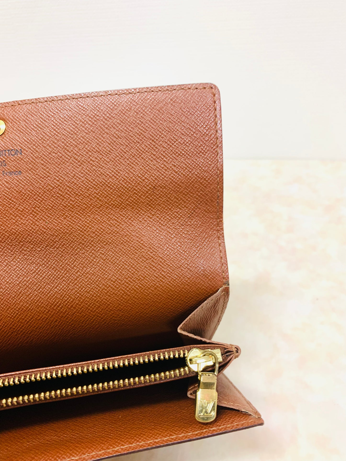 LOUIS VUITTON
Monogram Sarah Wallet