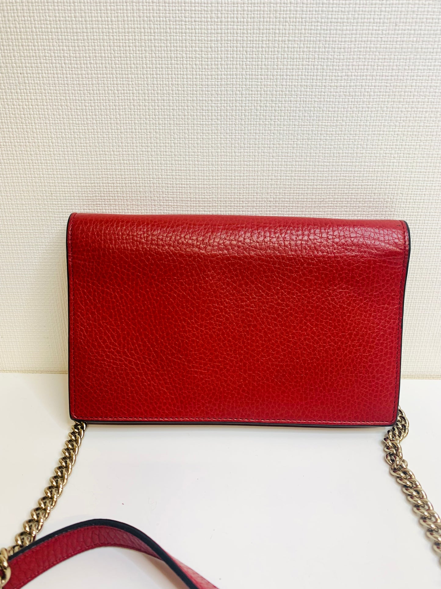 Gucci Interlocking G Leather Wallet on Chain.
