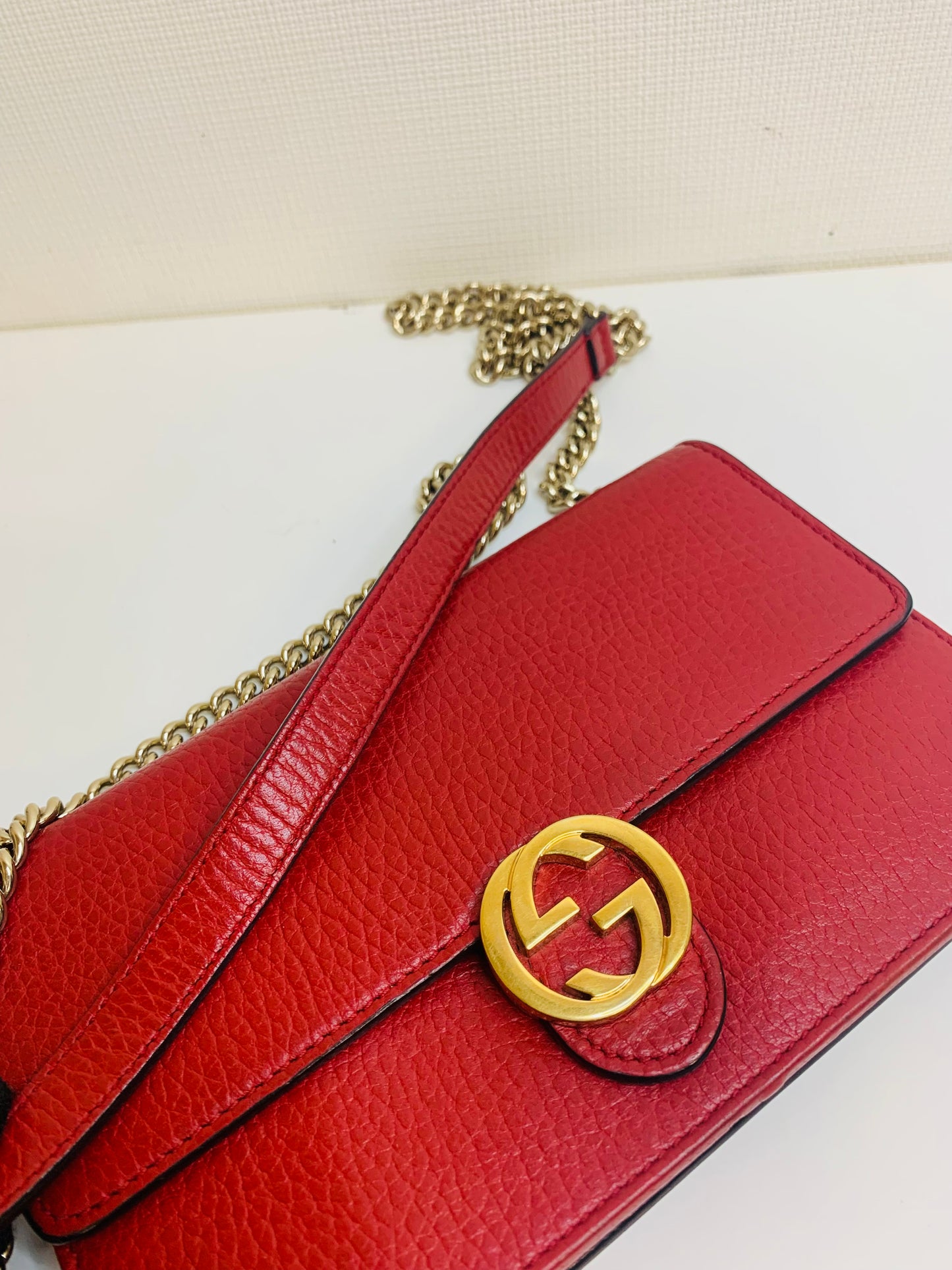 Gucci Interlocking G Leather Wallet on Chain.