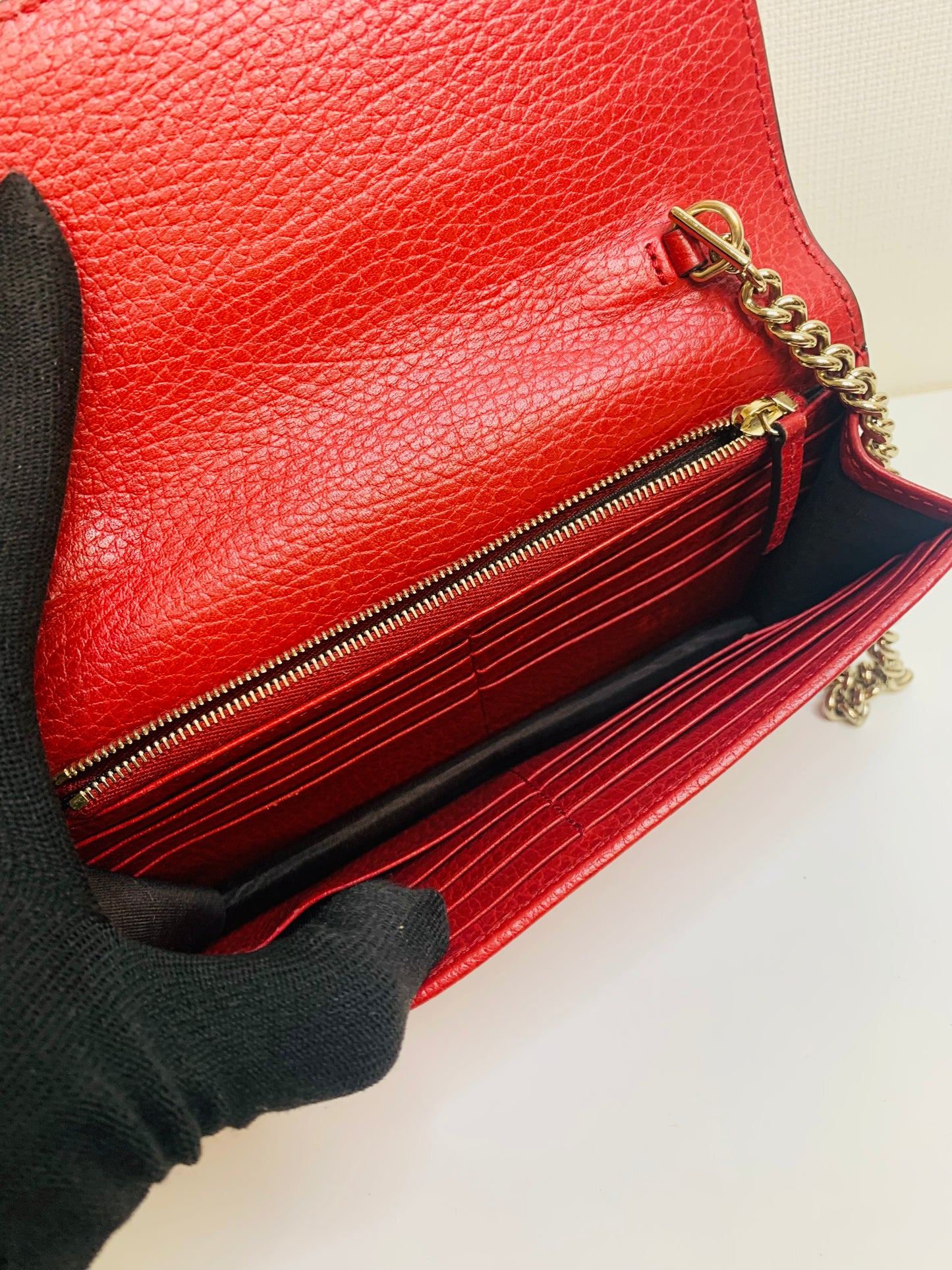 Gucci Interlocking G Leather Wallet on Chain.