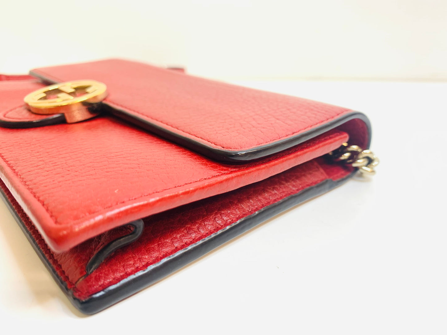 Gucci Interlocking G Leather Wallet on Chain.