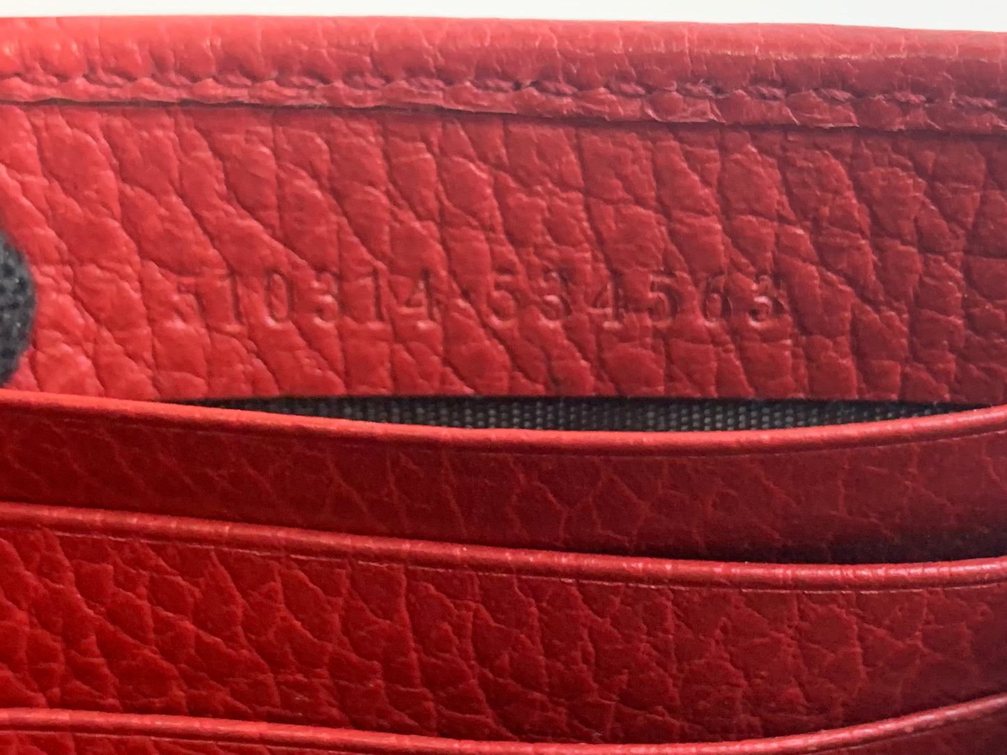 Gucci Interlocking G Leather Wallet on Chain.