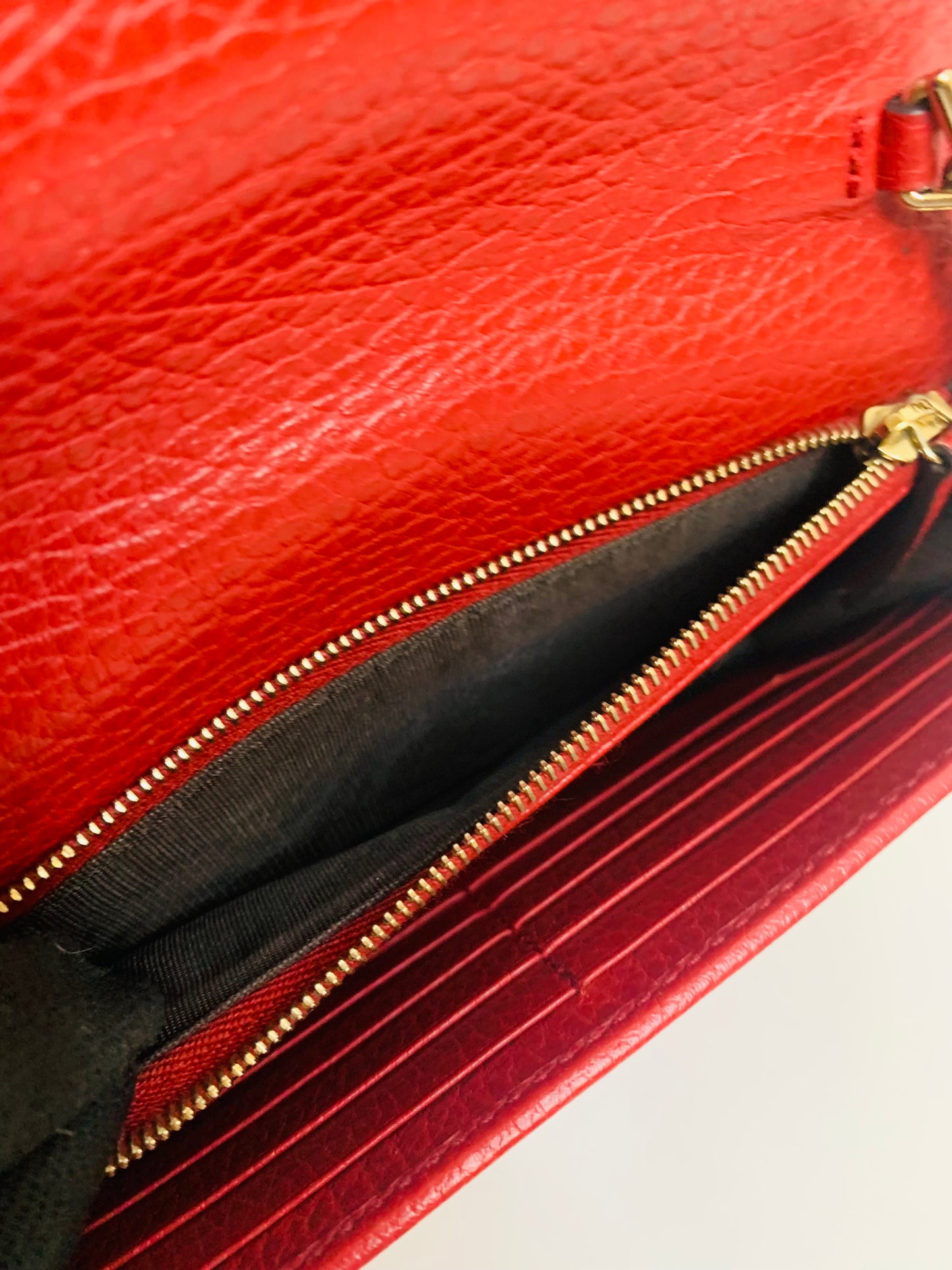 Gucci Interlocking G Leather Wallet on Chain.