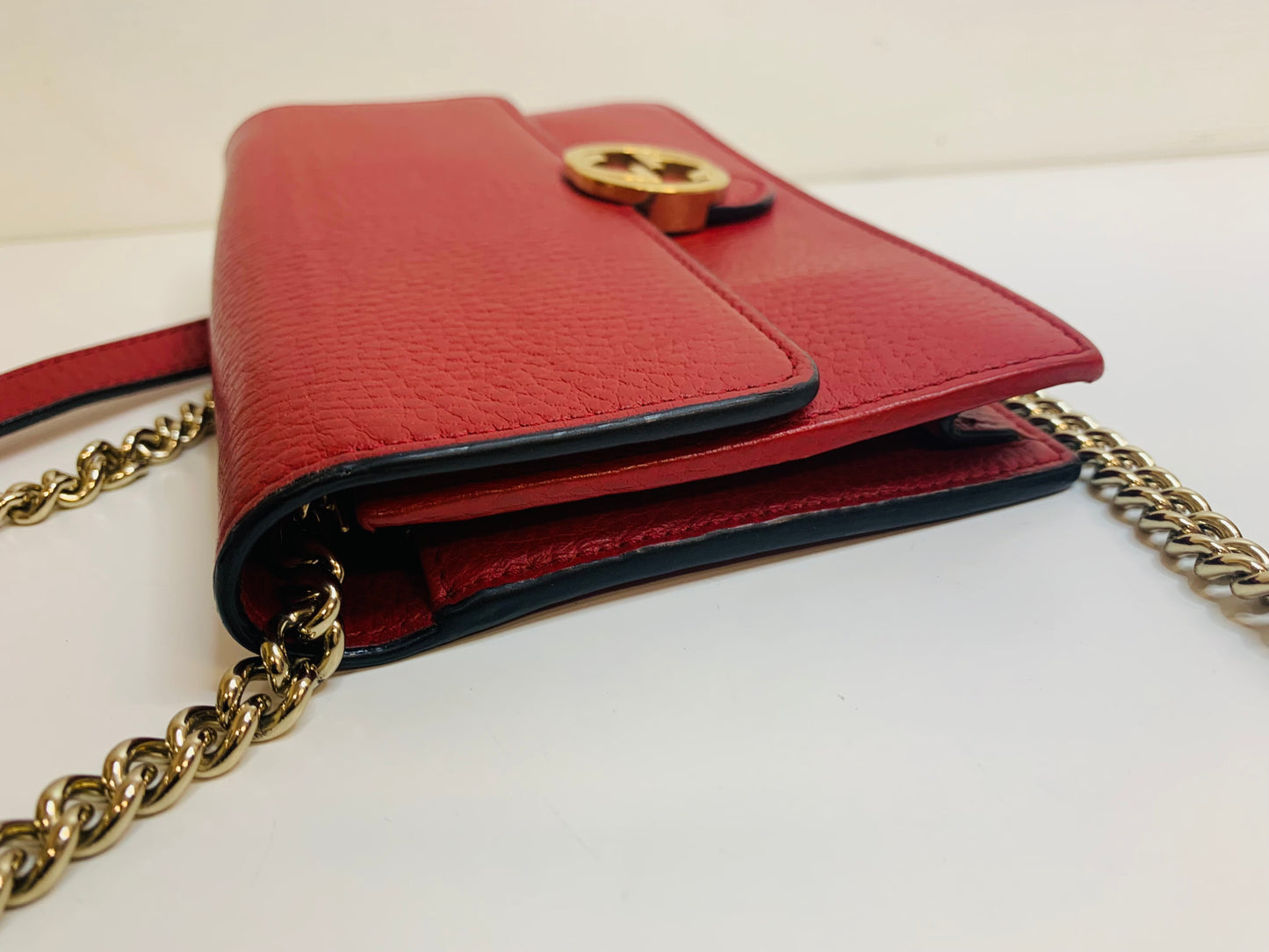 Gucci Interlocking G Leather Wallet on Chain.