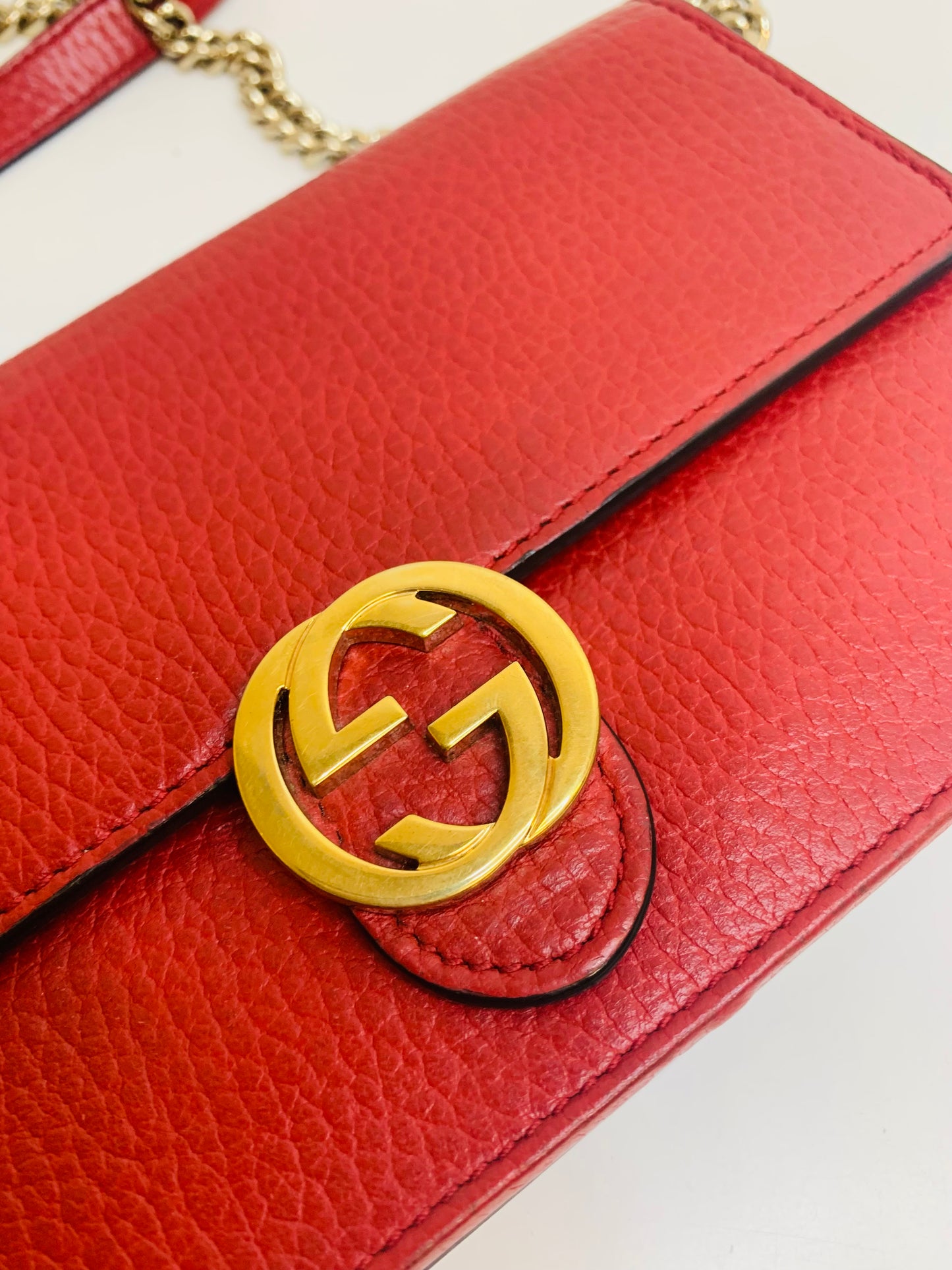 Gucci Interlocking G Leather Wallet on Chain.