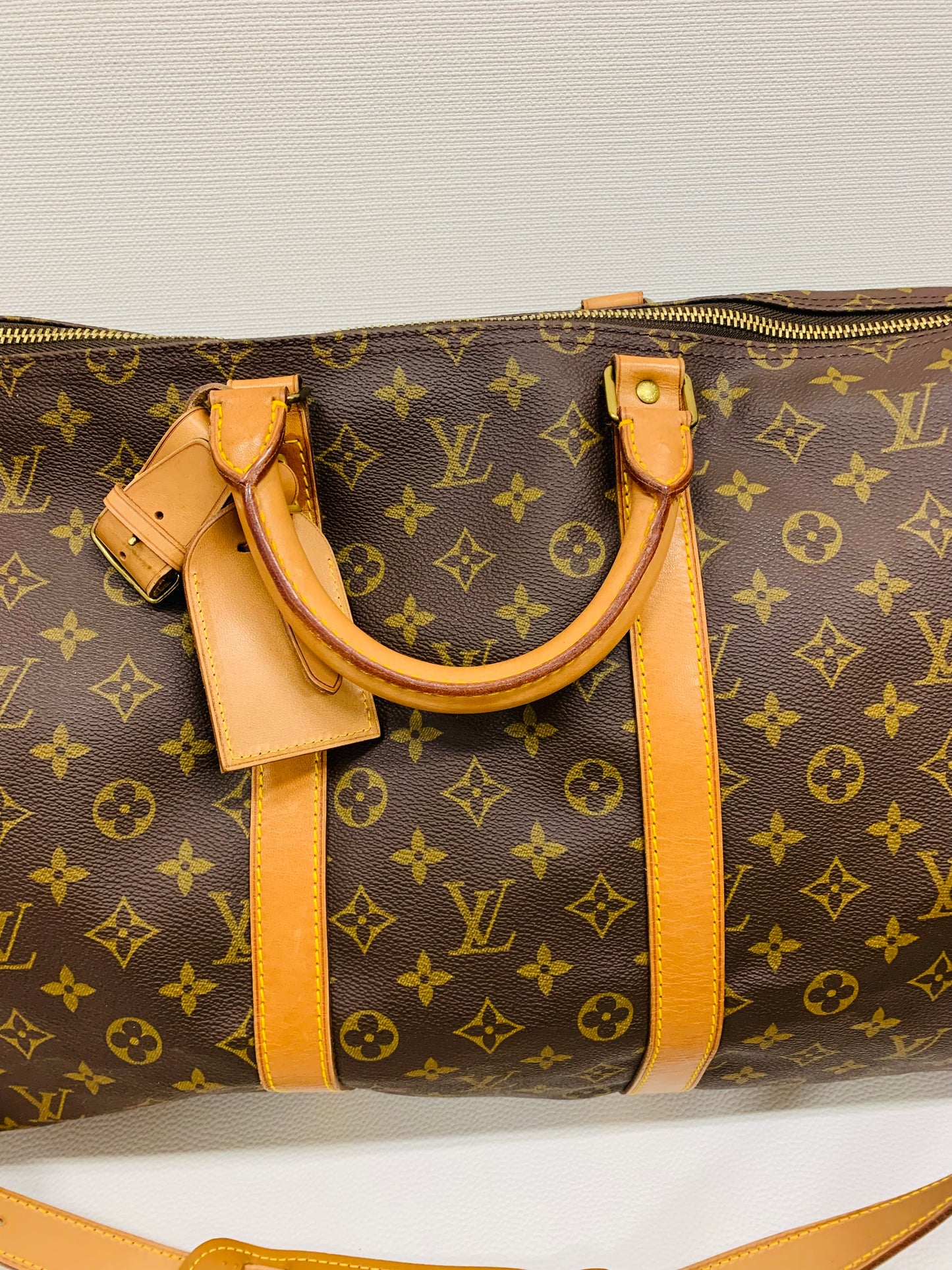 USED LOUIS VUITTON KEEPAL 55 BANDOULIERE