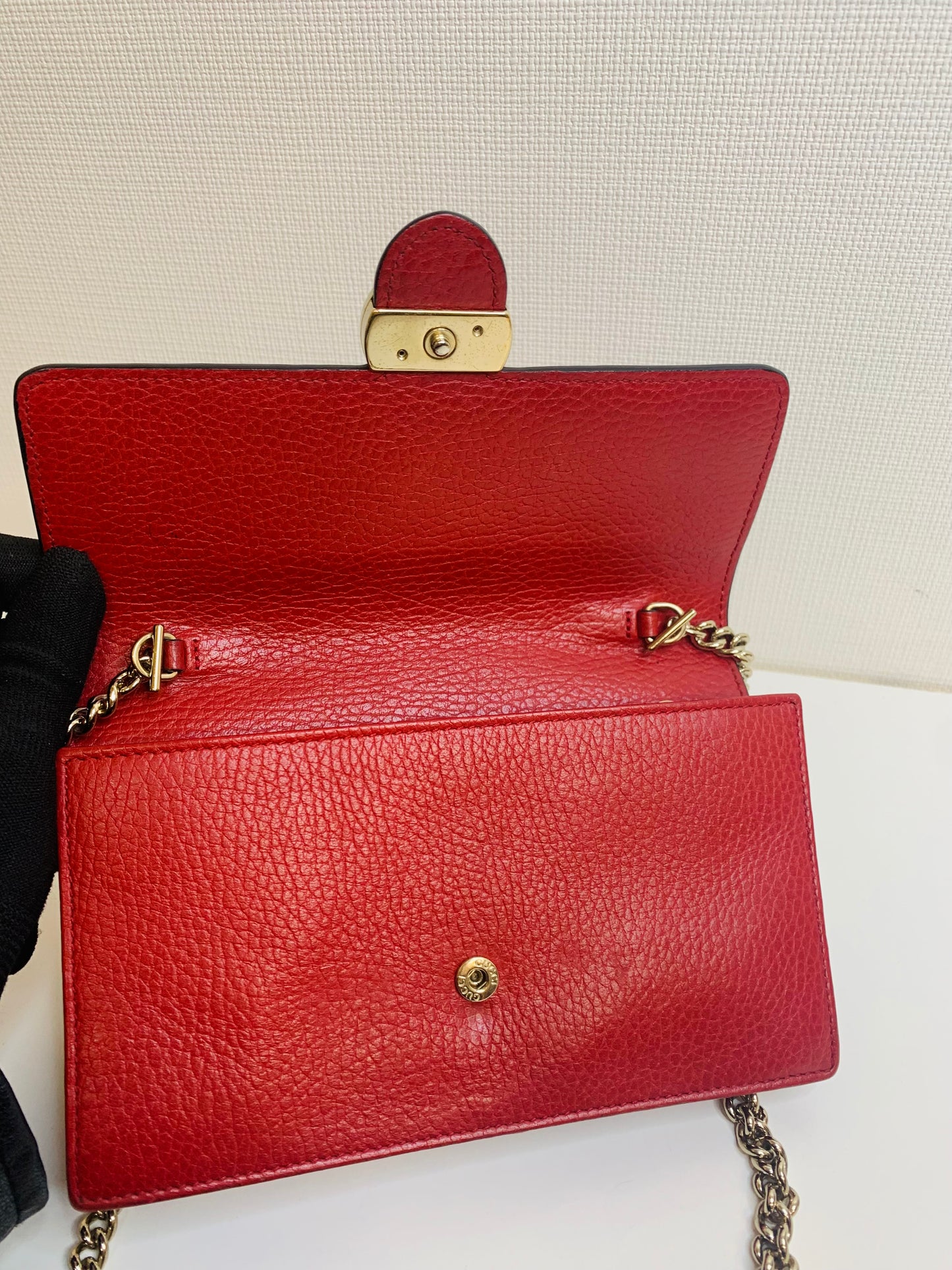 Gucci Interlocking G Leather Wallet on Chain.