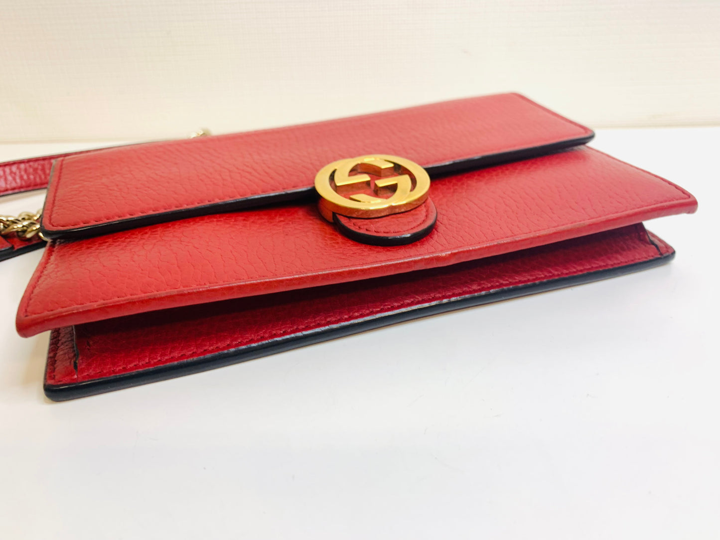 Gucci Interlocking G Leather Wallet on Chain.