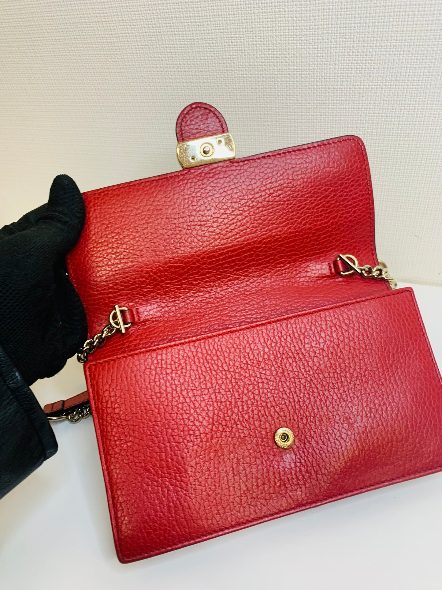 Gucci Interlocking G Leather Wallet on Chain.