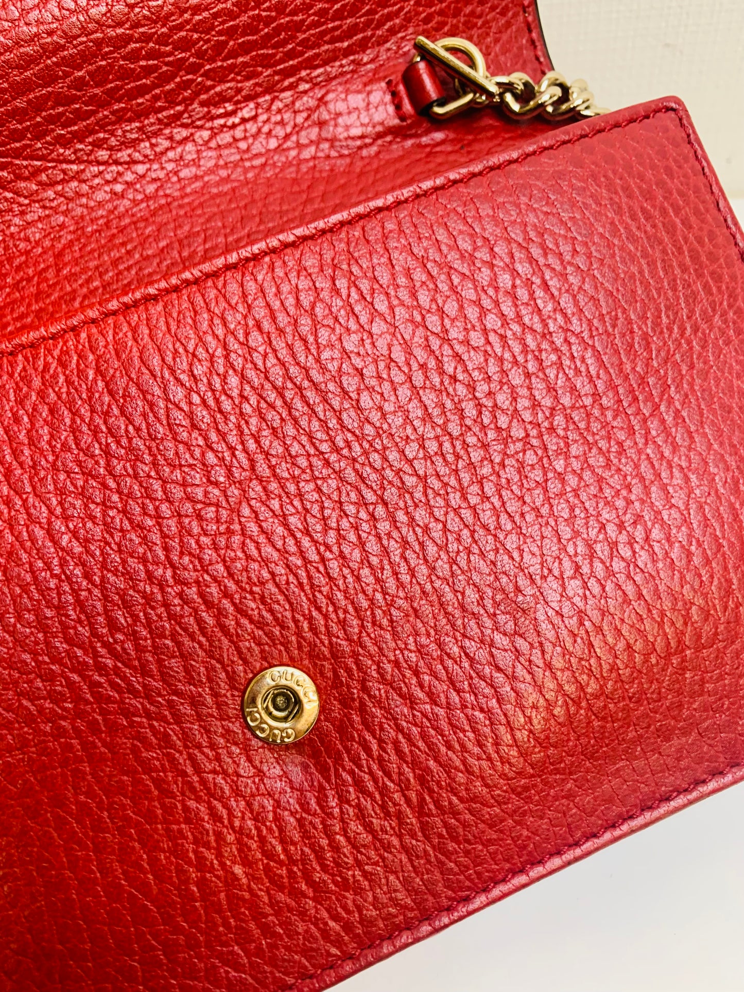 Gucci Interlocking G Leather Wallet on Chain.