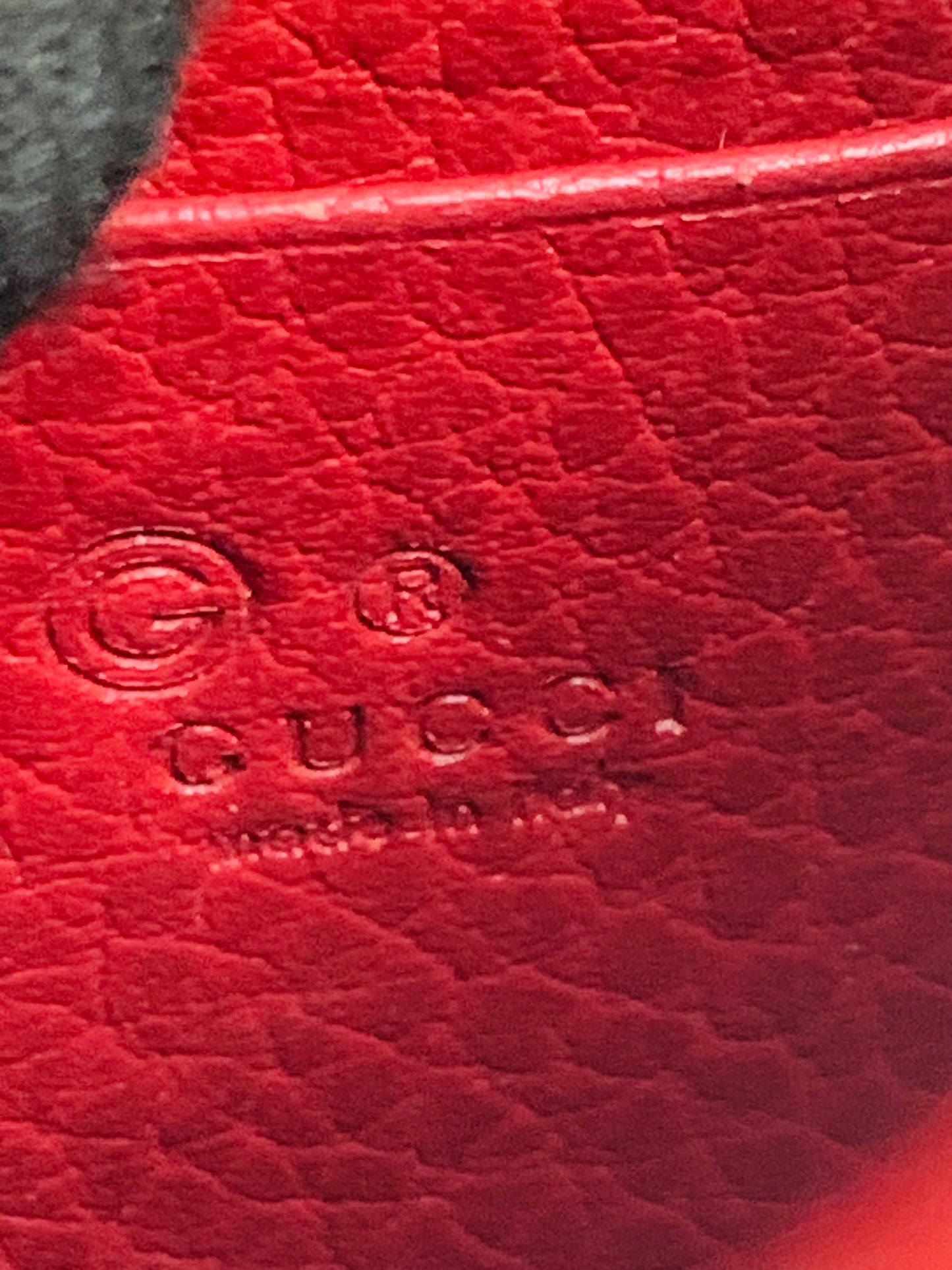 Gucci Interlocking G Leather Wallet on Chain.