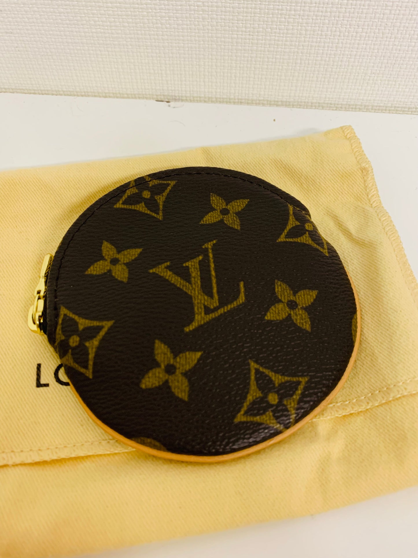 Louis Vuitton Round Coin Purse.