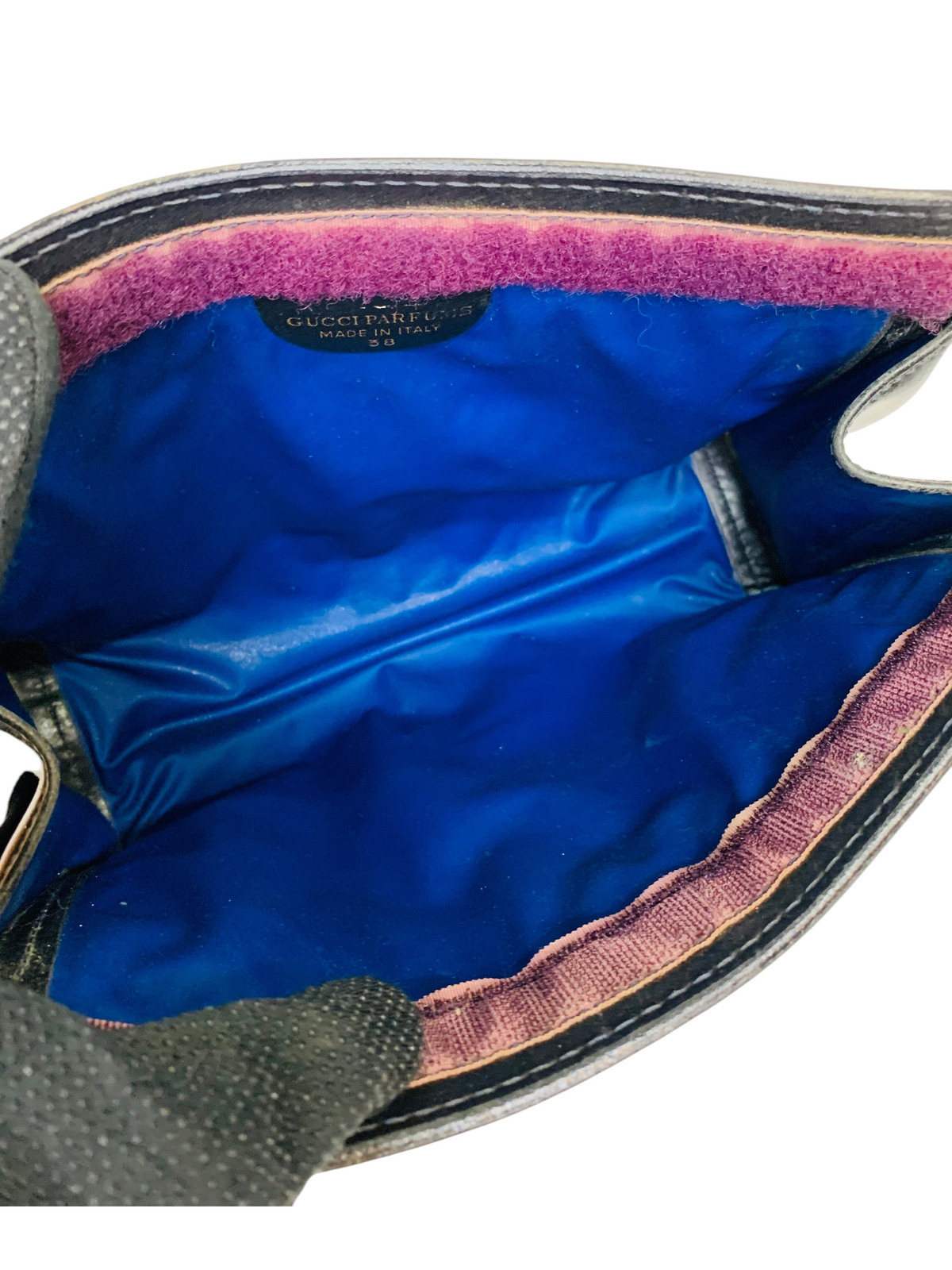 Cherry's Luxury Collection vintage Gucci Parfums bag interior with blue lining and purple velvet trim.
