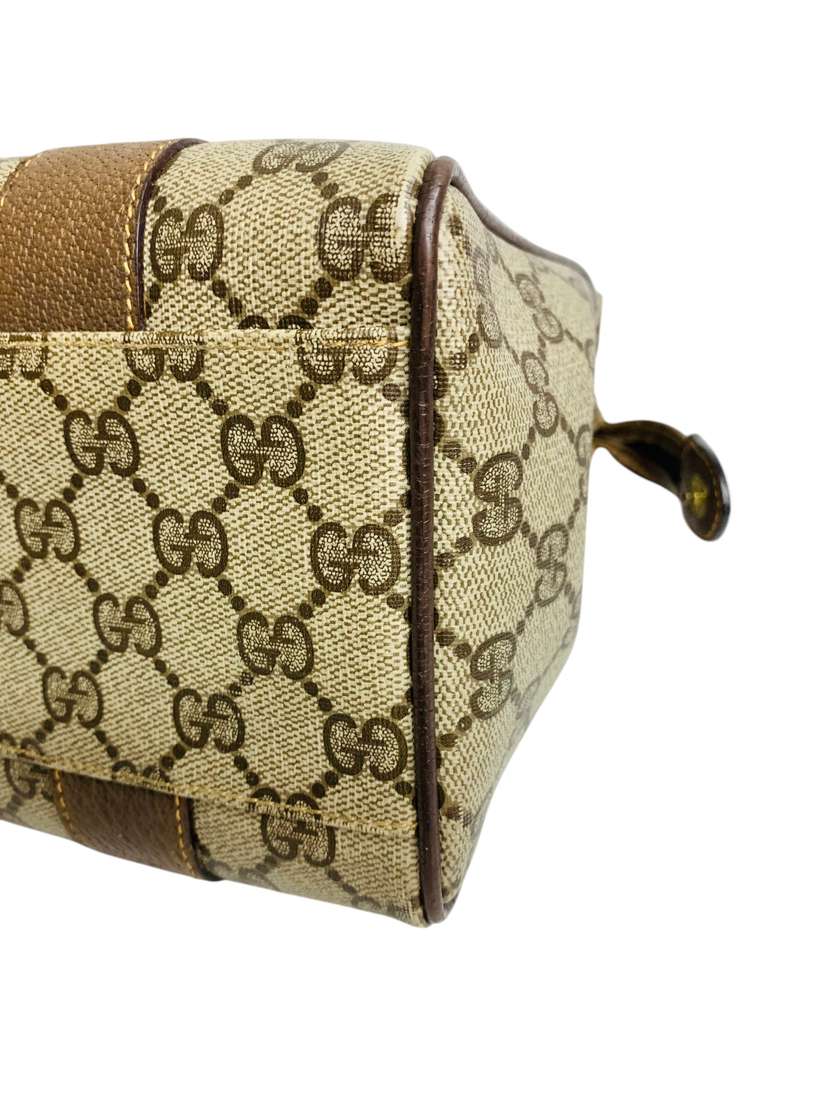 Cherry's Luxury Collection Gucci monogram canvas handbag with brown leather trim and side detail